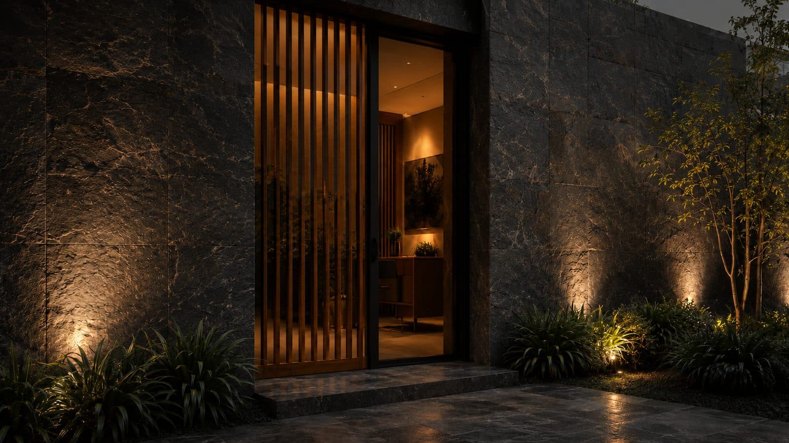 Dark stone entrance with warm architectural lighting